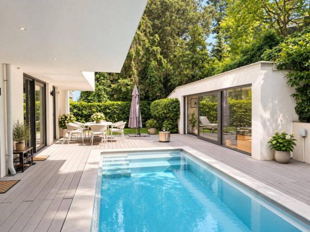 EG Wohnung mit Pool, Fitnessraum und Sauna im eigenen Garten