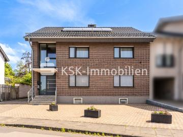 Doppeltes Glück: 2 geschossiges Wohnhaus mit 2 Wohneinheiten und 2 Garagen