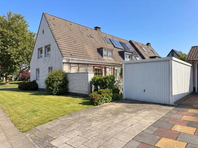 Doppelhaushälfte mit traumhaftem Garten in Herten Langenbochum