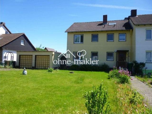 Doppelhaushälfte mit Wintergarten, Kamin, Balkon & Doppelgarage in Hofgeismar – Provisionsfrei von privat!