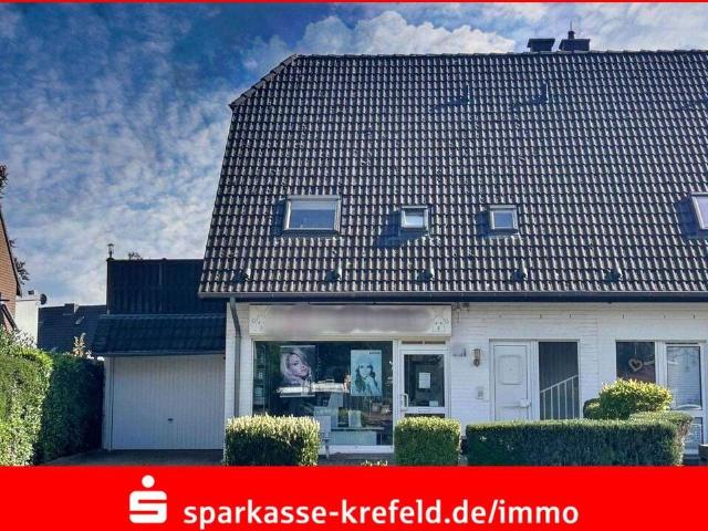 Doppelhaushälfte mit Ladenlokal