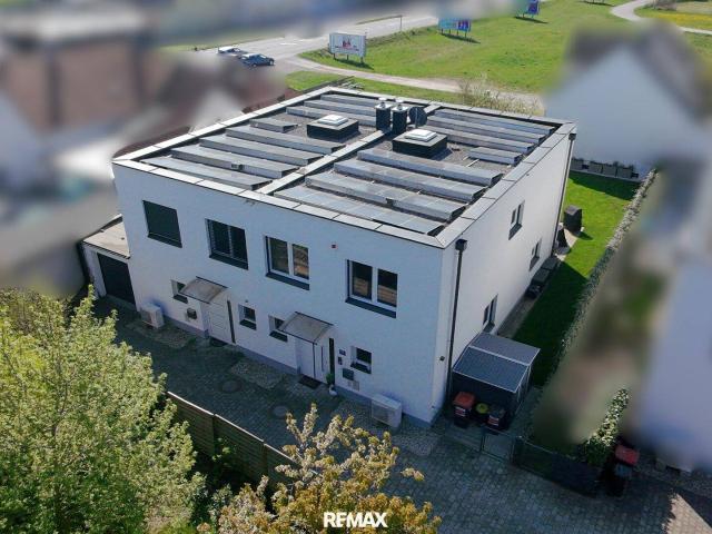 Doppelhaushälfte in St. Georgen: Wo Luxus auf Familienglück trifft