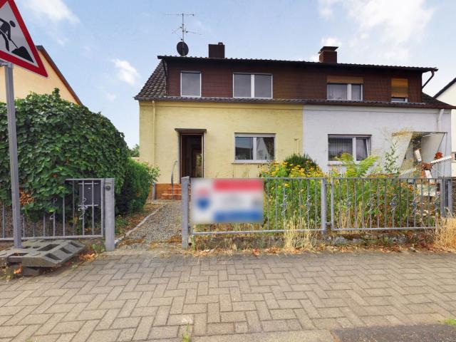 Doppelhaushälfte zurückgesetzt in einen Rohbau auf schönem Grundstück *Verkauf im Bieterverfahren