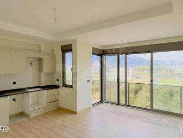 DÖSEMEALTIN'DA ÜNİVERİTE VE HASTANE YAKINI SATILIK 1+1 DAİRE
