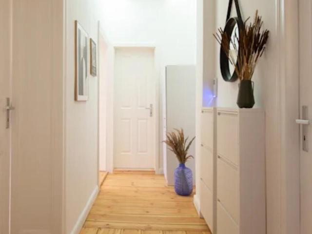 Double bedroom with a balcony, in Moabit