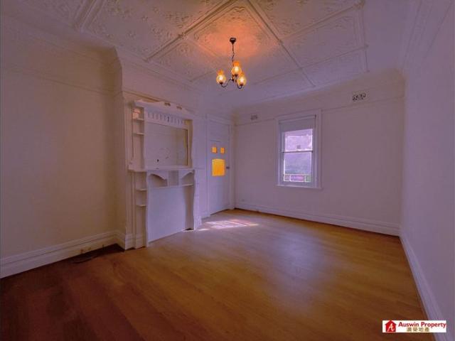 DOUBLE BRICK & BRIGHT FAMILY HOME WITH BACKYARD IN PRIME LOCATION