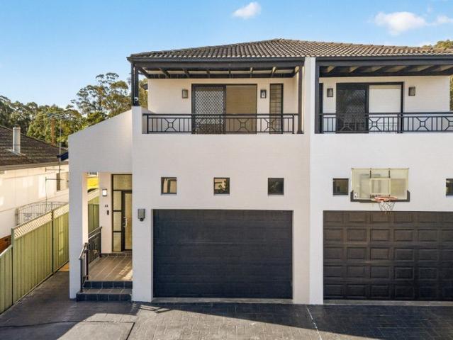 Double Brick Duplex With Dual Balconies, Thoughtful Design, And Ultimate Privacy