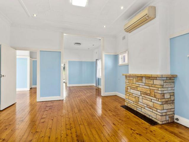Double Brick Family Home In McRaes Estate: Light Filled, Large Backyard, Home Office Space, Auto Garage, Walk To Train, Bus, Cafes, Shops & Schools!