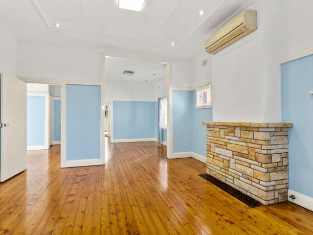 Double Brick Family Home In McRaes Estate: Light Filled, Large Backyard, Home Office Space, Auto Garage, Walk To Train, Bus, Cafes, Shops & Schools!
