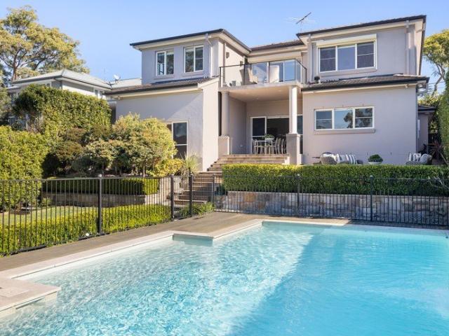 Double brick family home with level lawns & pool on 885sqm of land