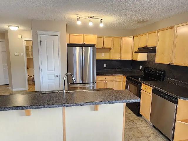 Double Garage, Partial Finished Bsmt, 4 Bedroom + Den, West Facing, Fenced
