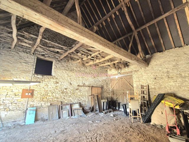 Double grange 110m2 potentiel d'aménagement 220m2 terrain 600m2 environ