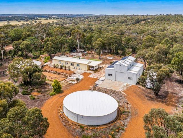 Downsize to 2ha, or live onsite and build later. Granny flat, 130sqm shed and over 530,000L of water