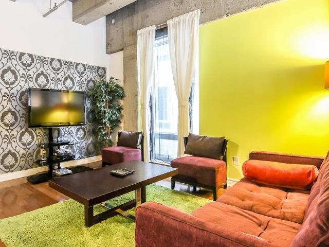 Downtown Montreal Furnished Condo Rental at Saint Alexandre Lofts Modern 2 Bedroom with 2 Bathroom plus Exposed Concrete and Hardwood Floors
