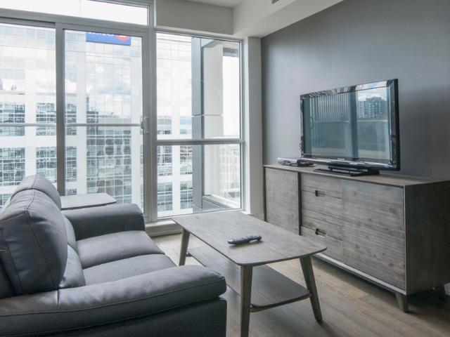 Downtown Ottawa Furnished Condo Rental At The Slater – Premium 1 Bedroom Suite With Large Closet And Great Building Amenities
