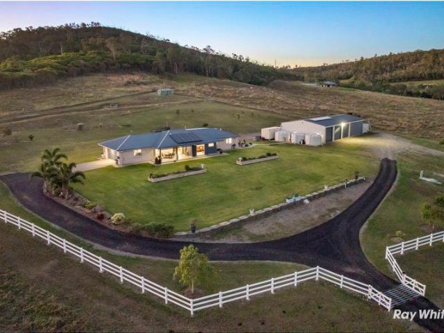 Dream Acreage: Elevated Living with Sensational Valley Views on 22.7 Acres