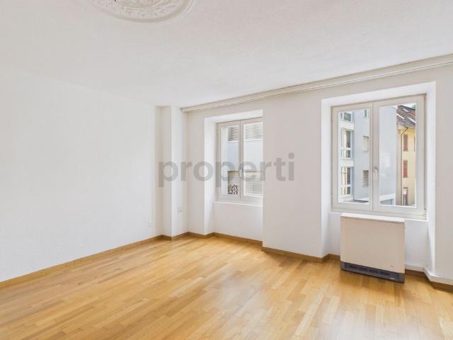Dreamy lake view, sunny balcony and historic old building charm