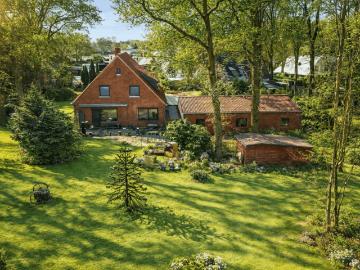 Drei Einheiten, viele Möglichkeiten Attraktives Mehrfamilienhaus in Lilienthal
