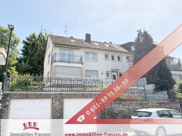 Dreifamilienhaus in Trier Olewig: Garten, 2 Garagen, voll unterkellert