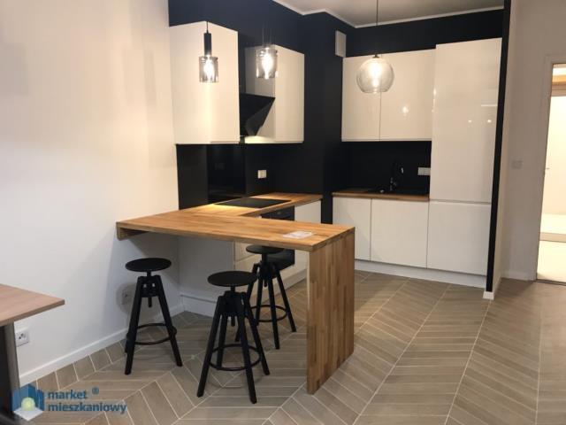 Dwa pokoje z garażem i komórką w apartamentowcu!