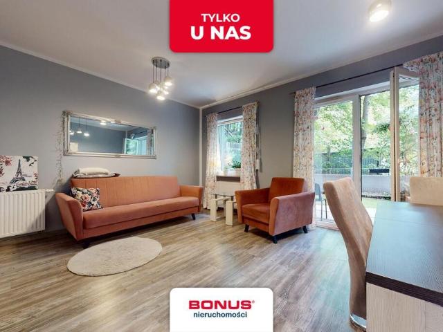 Dwupokojowy apartament z ogródkiem i miejscem zapraszam