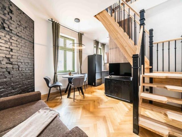 Dwupoziomowe loftowe mieszkanie kamienica Jeżyce 60 m²