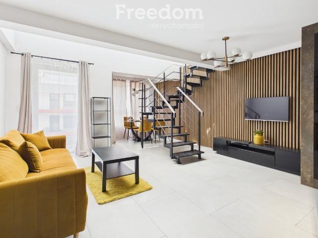 Dwupoziomowe mieszkanie 69,9 m² z nowoczesnym designem i antresolą