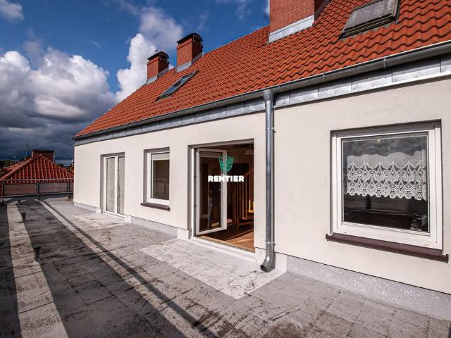 Dwupoziomowe mieszkanie 105 m² z tarasem i garażami
