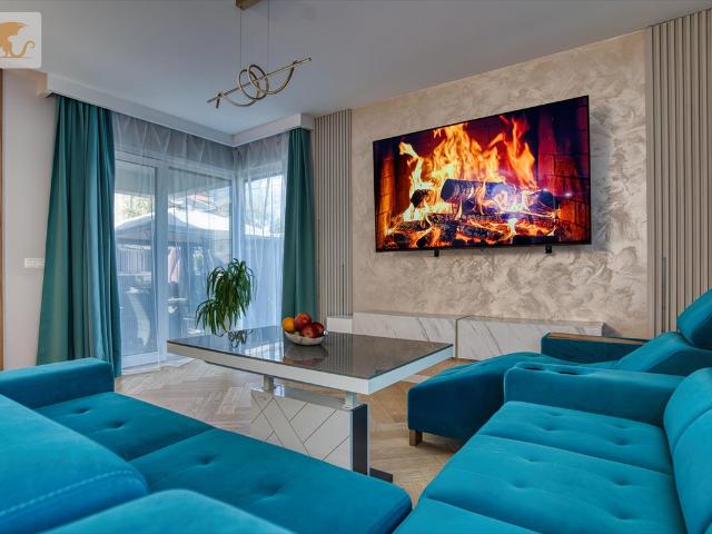 Dwupoziomowy apartament z ogrodem i tarasem na dachu