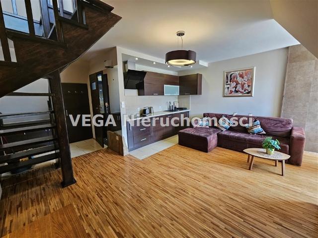 Dwupoziomowy apartament z widokiem na góry w Kościelisku