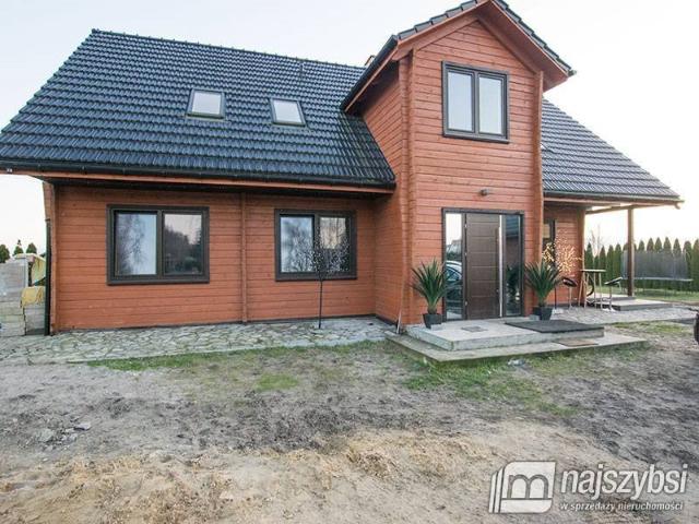 Do sprzedania przestronny dom z bala 260 m² + 5 domków letniskowych