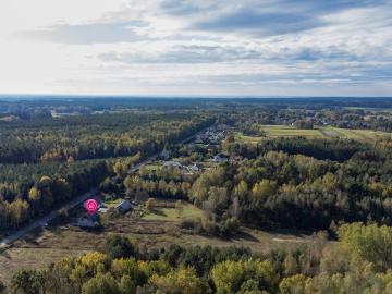 Duża działka 6250 m² z budynkiem w stanie surowym