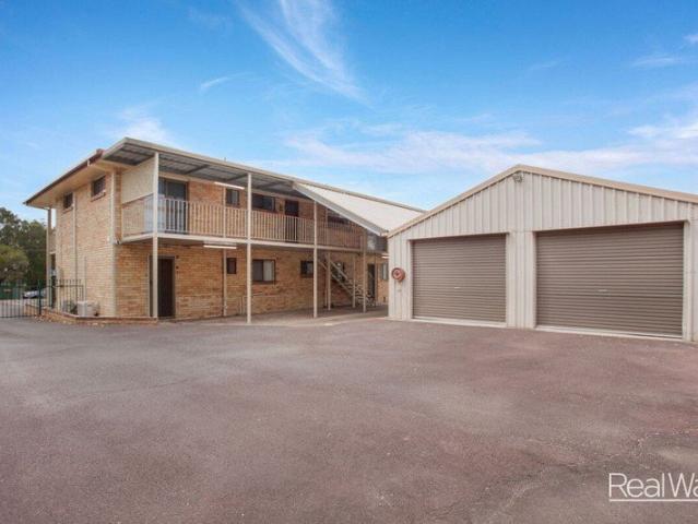 DUAL OCCUPANCY LIVING WITH MULTIPLE LIVING AREAS, ONE LARGE KITCHEN + TWO KITCHENETTES, MASSIVE 5 BEDROOM, 3 BATHROOM HOME WITH HUGE 4 BAY SHED