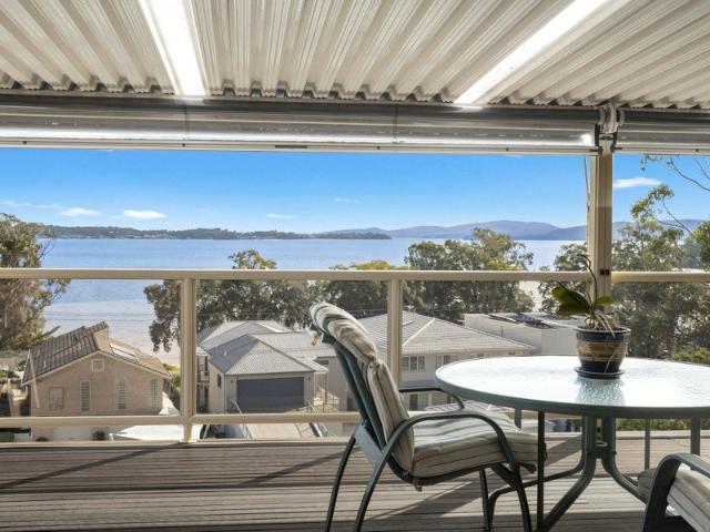 Dual Frontage Elevated Coastal Living with Spectacular 180Â° Water Views