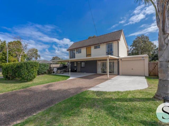 Dual Income/2 Families Renovated Home, Big Block, Big Potential to Add a Granny Flat, Super Shed & a Pool, Just 1 Home off The Lake!