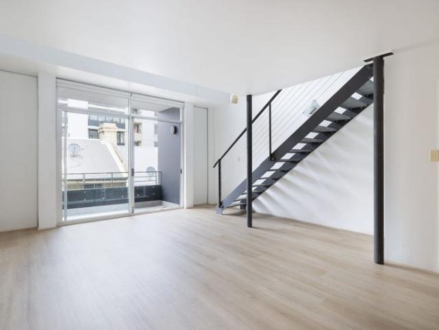 Dual level apartment with Manhattan inspired ambience