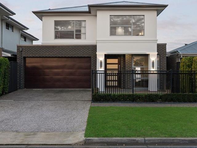 Dual Level Designer Living For The Distinguished, Entertaining Family
