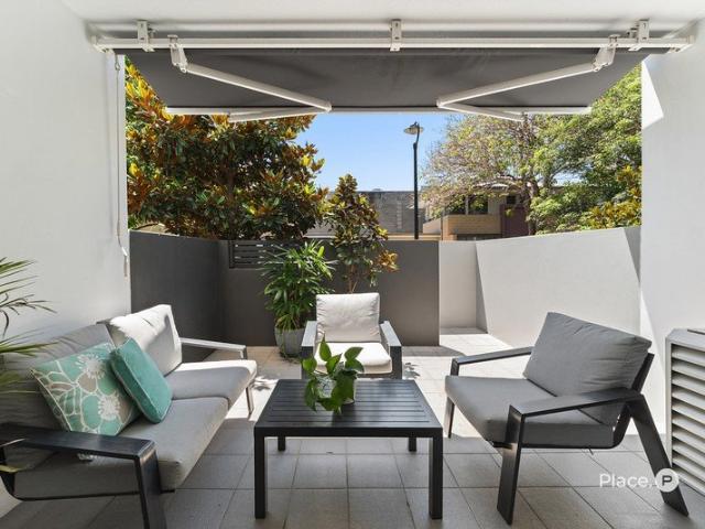 Dual Level Riverside Living with Private Courtyard Street Access