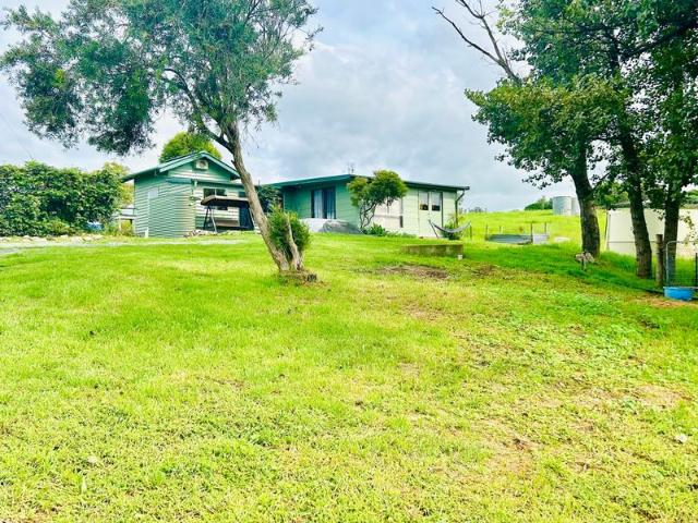 Dual living 10 acres with creek frontage, spa deck & 17ML Bega river water licence