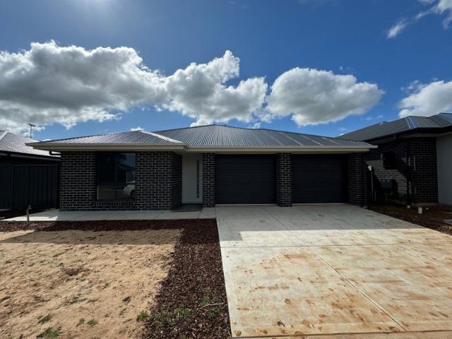 Dual Living Three Bedroom, Two Bathroom Home in Munno Para West!