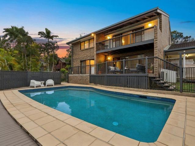 Dual Living with Poolside Entertaining and Elevated Views