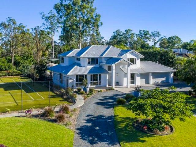 Dual living acreage haven in a premier location