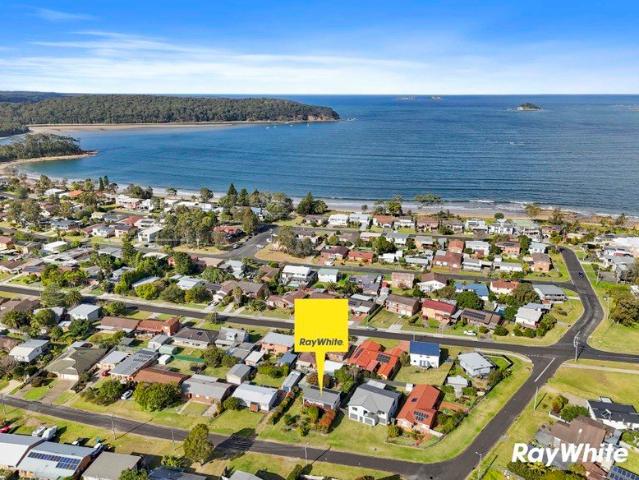 Dual living, coastal home within a walk to the beach!
