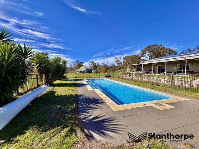 DUAL LIVING, DONE RIGHT A ranch homestead, a private cottage, and 12.3 hectares of rural serenity just 15 minutes from Stanthorpe