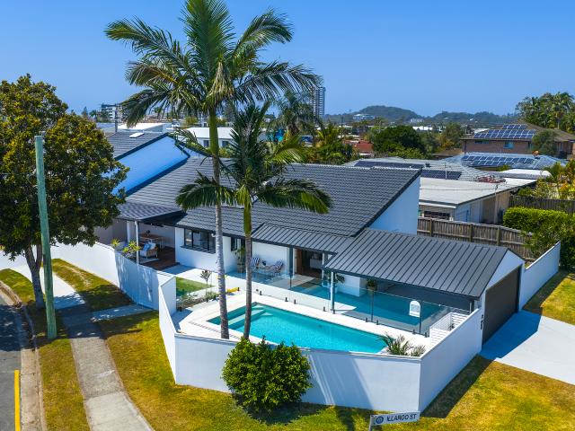 Dual Living Dream Renovated Oasis in a Prime Palm Beach Location