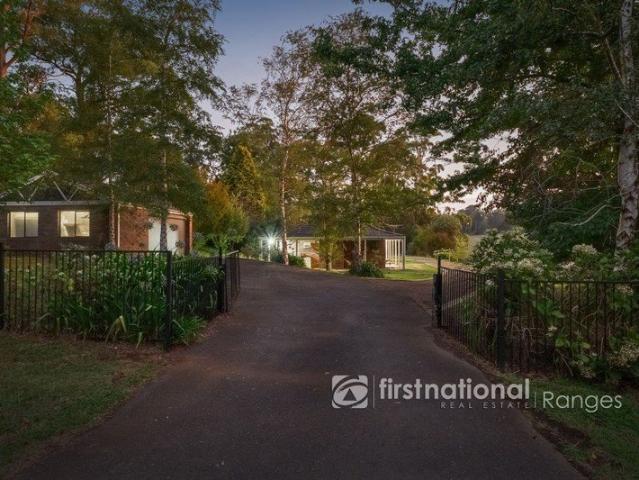 Dual Living Lifestyle with Breathtaking Views on nearly 1 acre on a sealed no through road!