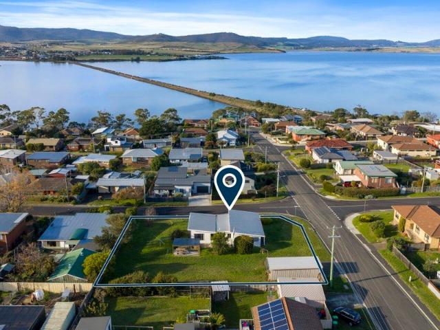 Dual Title Opportunity with Water Views & Endless Potential