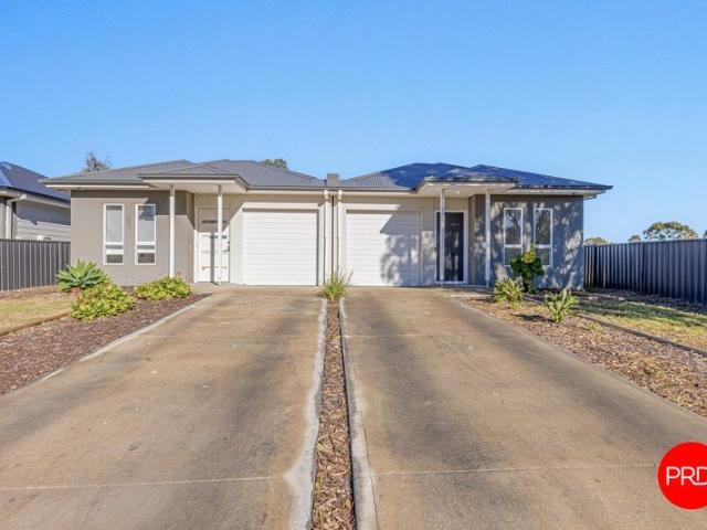 Dual Townhouse Opportunity in Growing Huntly