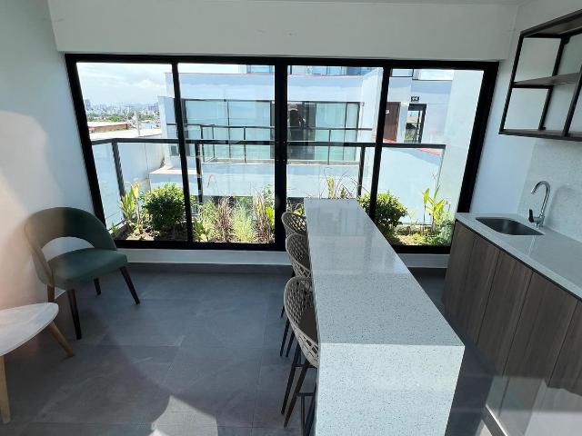Dúplex con terraza y balcón en primer piso