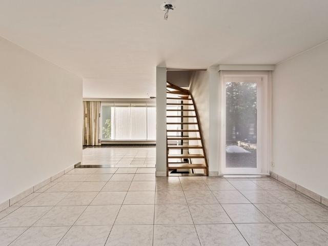 Duplex appartement met tuin en garage